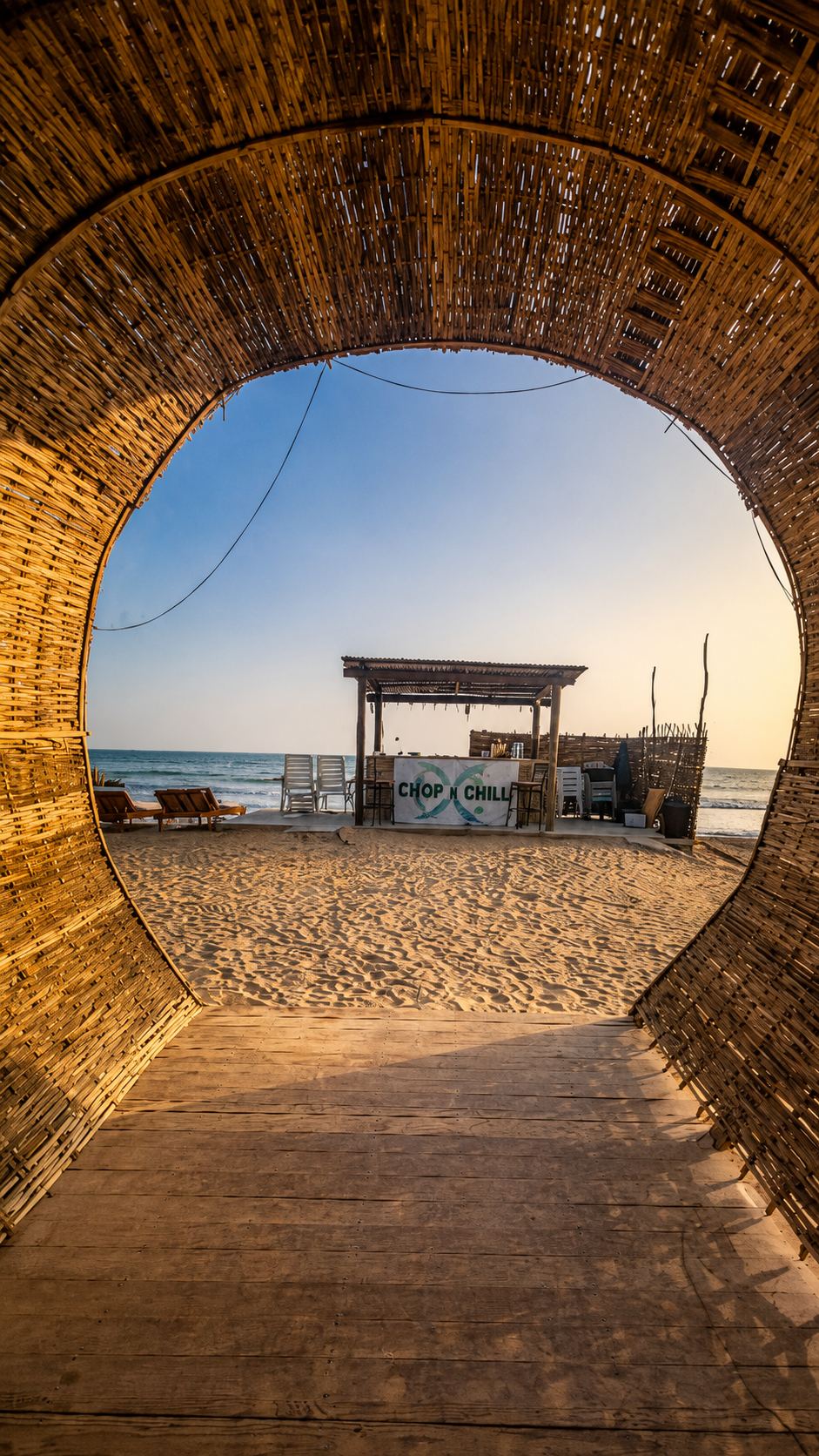 Bamboo entrance looking towards Chop n Chill Beach Club and the ocean